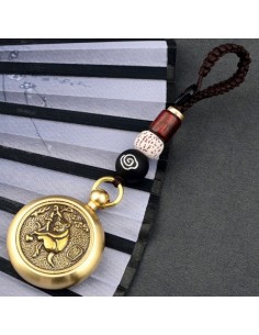 AMULETO MONO CON MONEDA...